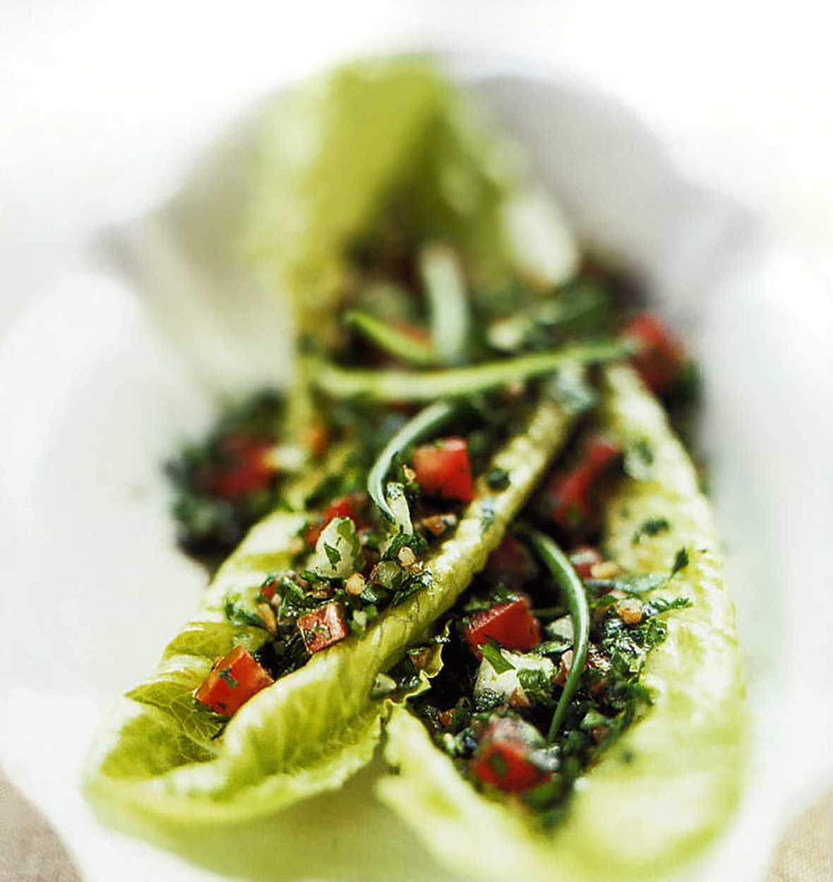 Two romaine leaves topped with a scoop of easy tabbouleh.