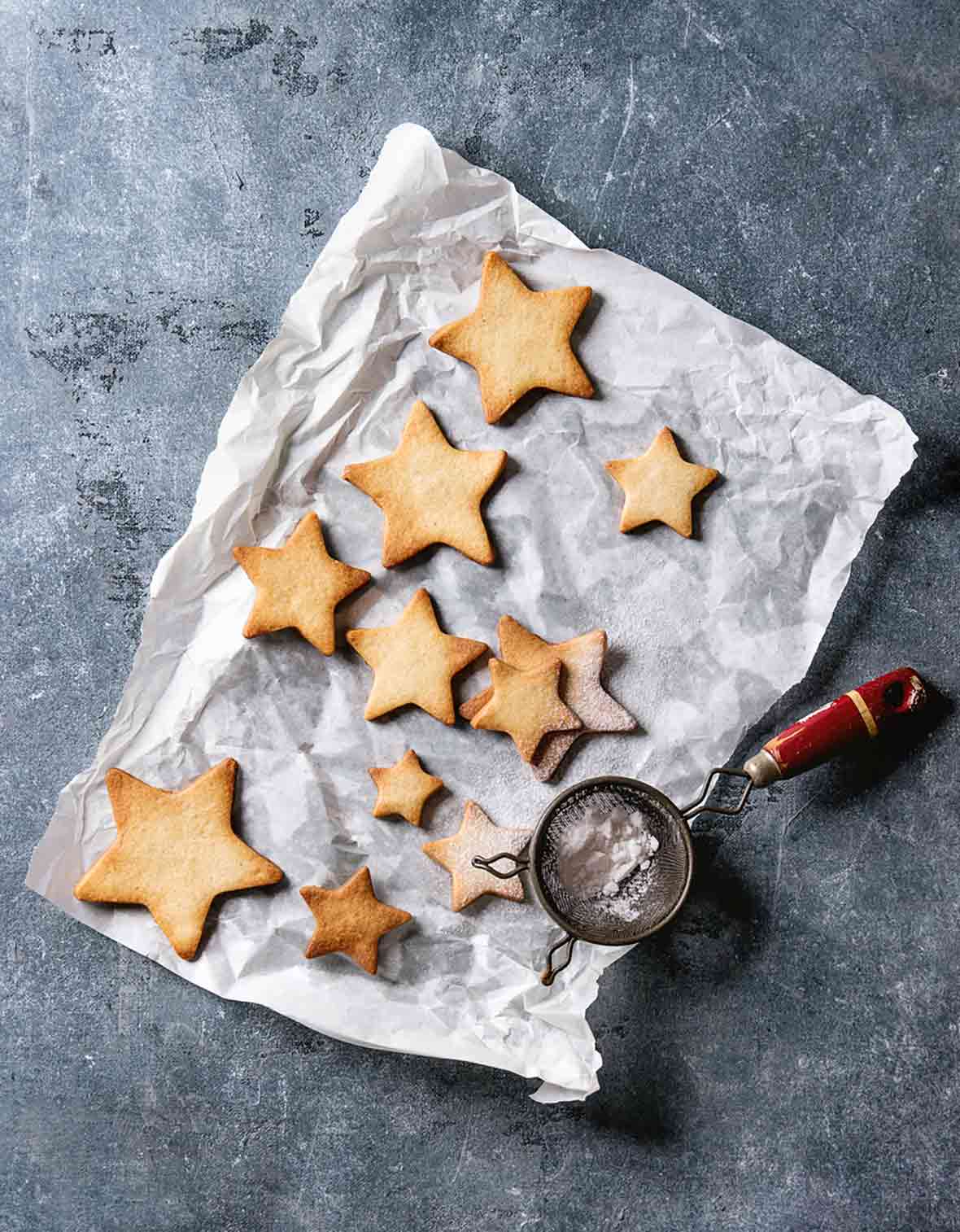 Star-shaped cookies on a piece of parchment paper