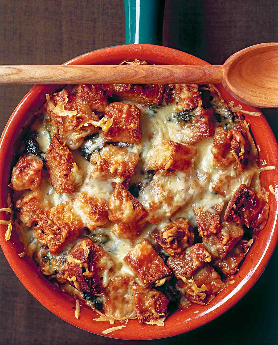 Panade--bread soup--with leeks, mixed greens, and Cantal cheese in a pot