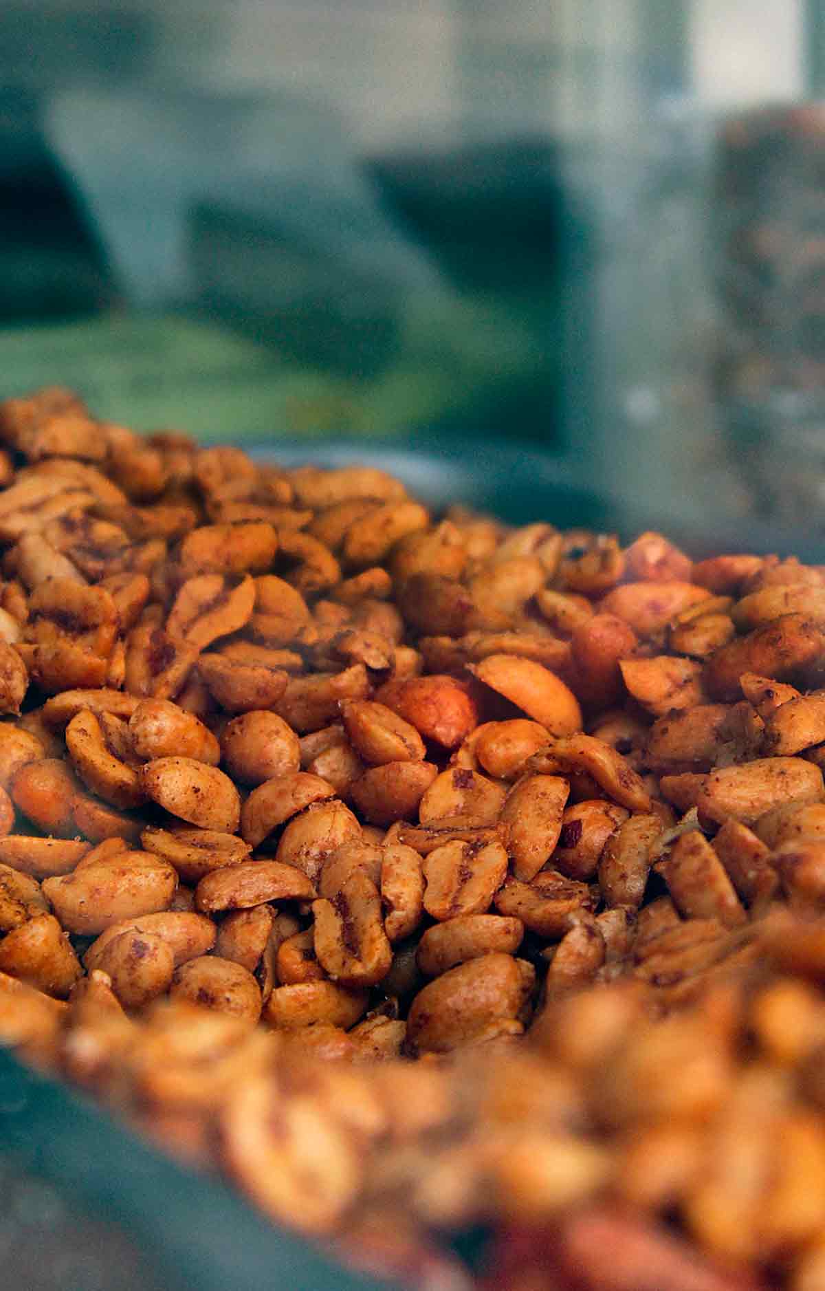A bowl of dry-roasted chile peanuts.