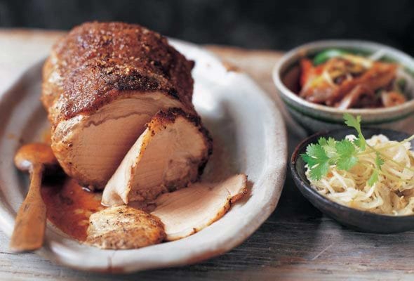 Szechuan spice-rubbed pork loin covered with ground Szechuan peppercorns, condiments on the side