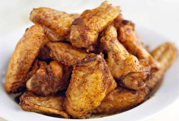 A bowl of Chinese five spice chicken wings.