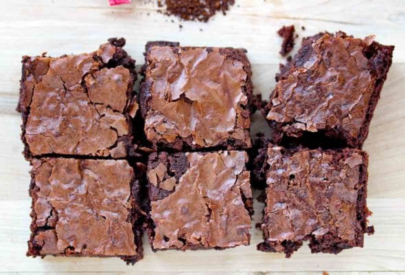 Six one-bowl mocha brownies on wood