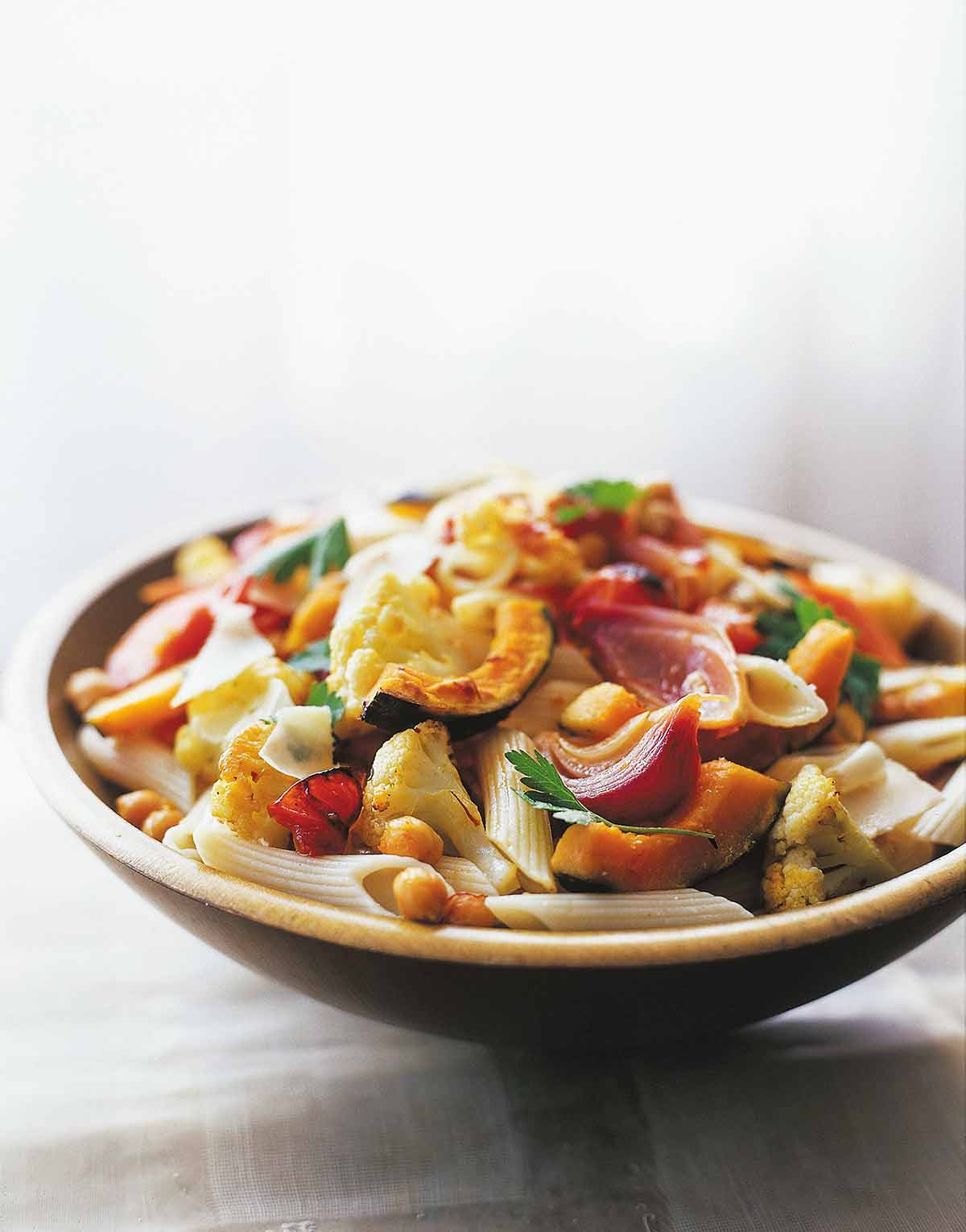 Wooden bowl of pasta with Roasted Vegetables