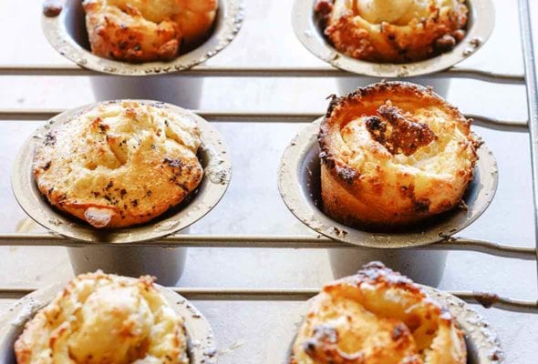 A rack of six golden brown and puffy Yorkshire pudding
