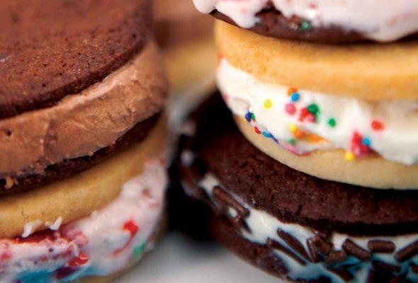 Several ice cream cookie sandwiches stacked on top of each other.