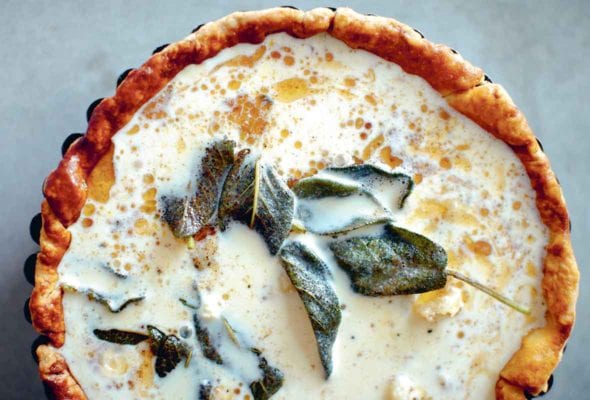 An uncooked butternut squash quiche.