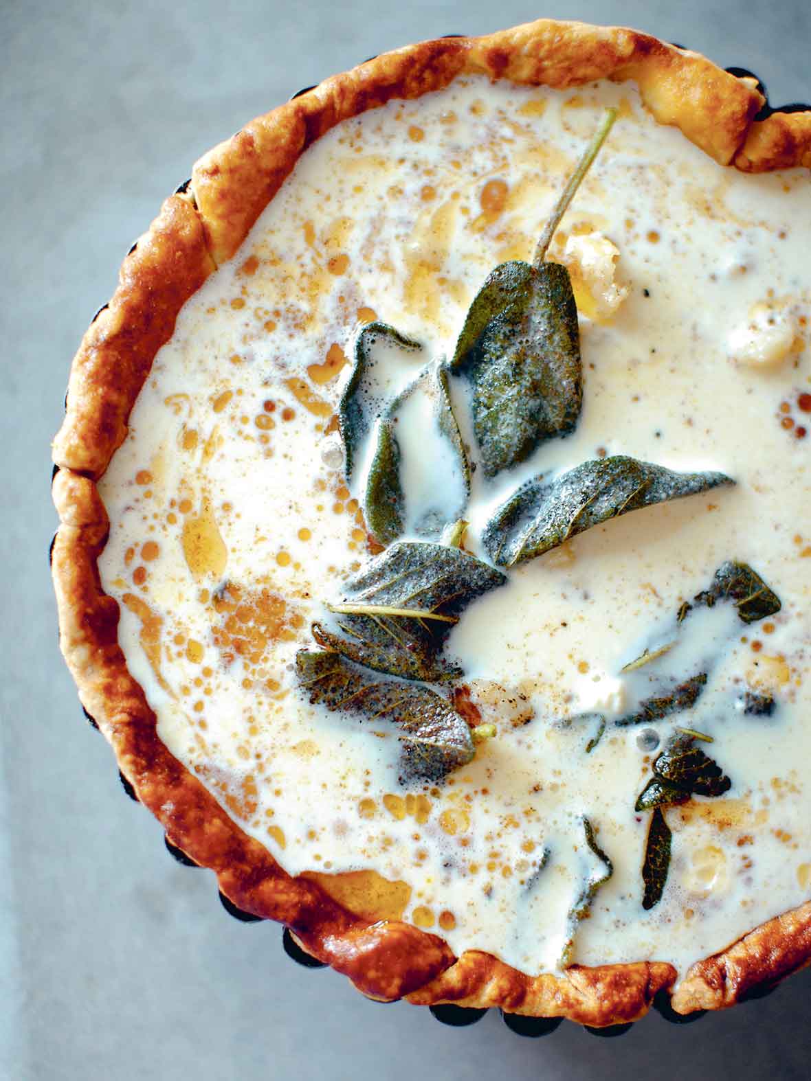 An uncooked butternut squash quiche.