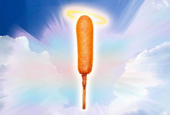 A corn dog with a halo on a heavenly sky