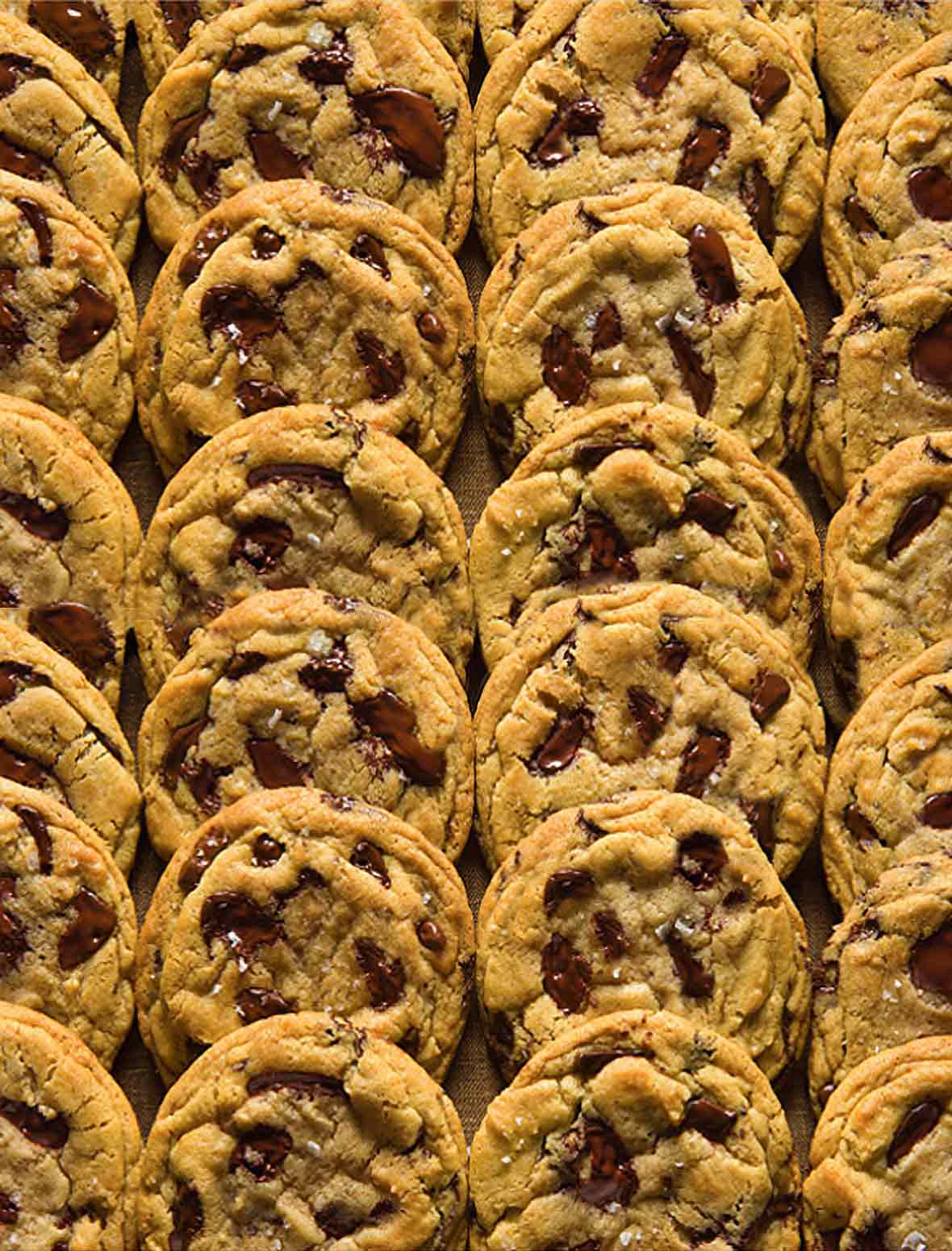 2 dozen overlapping ultimate chocolate chip cookies via David Leite from The New York Times