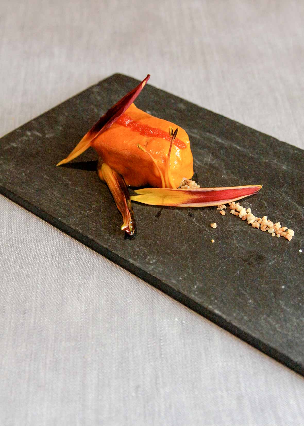 salt cod napped with a hazelnut Romesco sauce