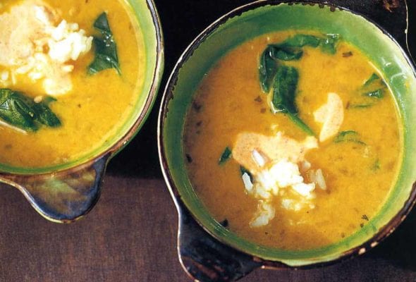 This hearty, healthy yellow pea and coconut milk soup is filled with plenty of goodness, including rice, spinach, and spices.