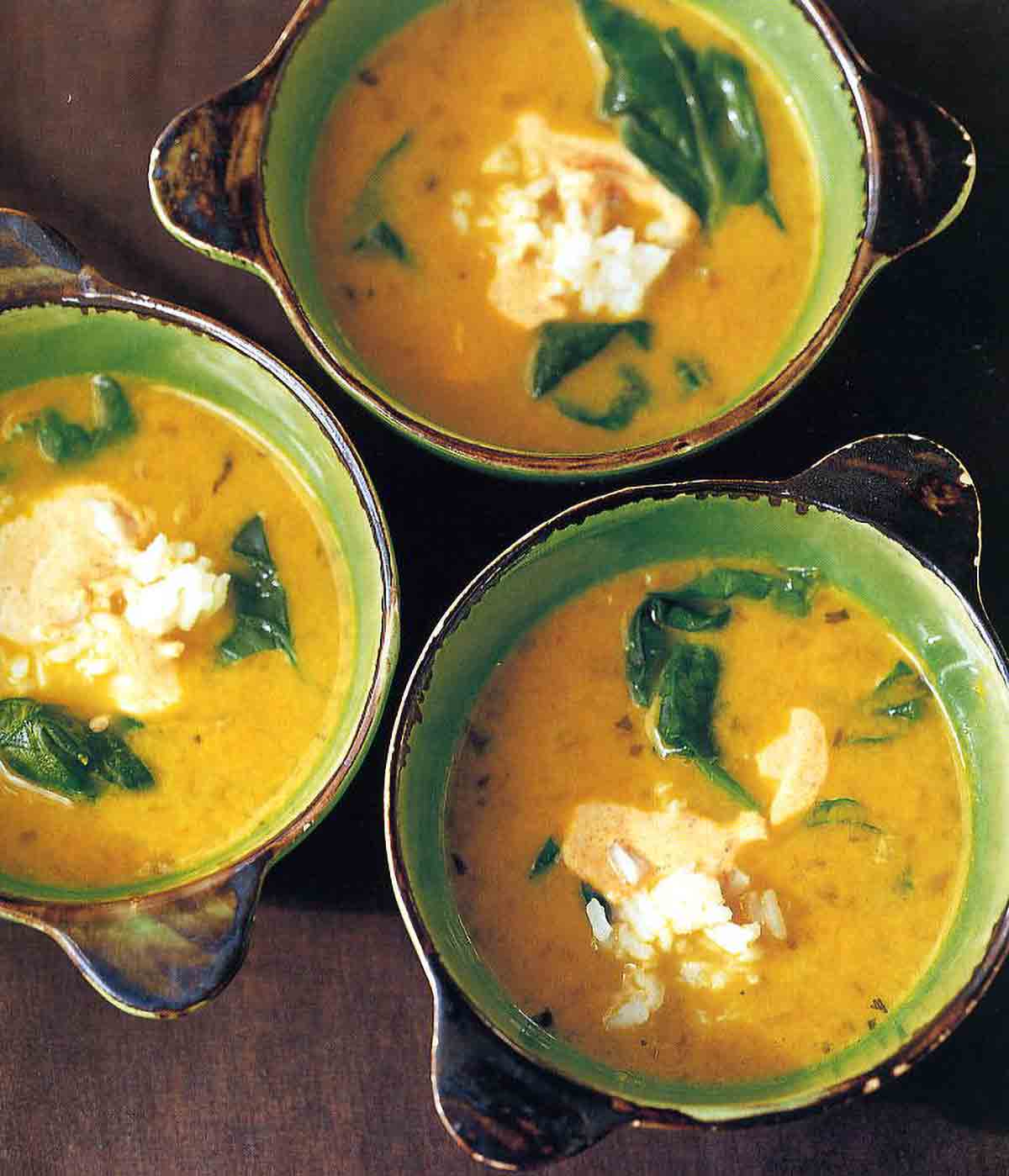 This hearty, healthy yellow pea and coconut milk soup is filled with plenty of goodness, including rice, spinach, and spices.