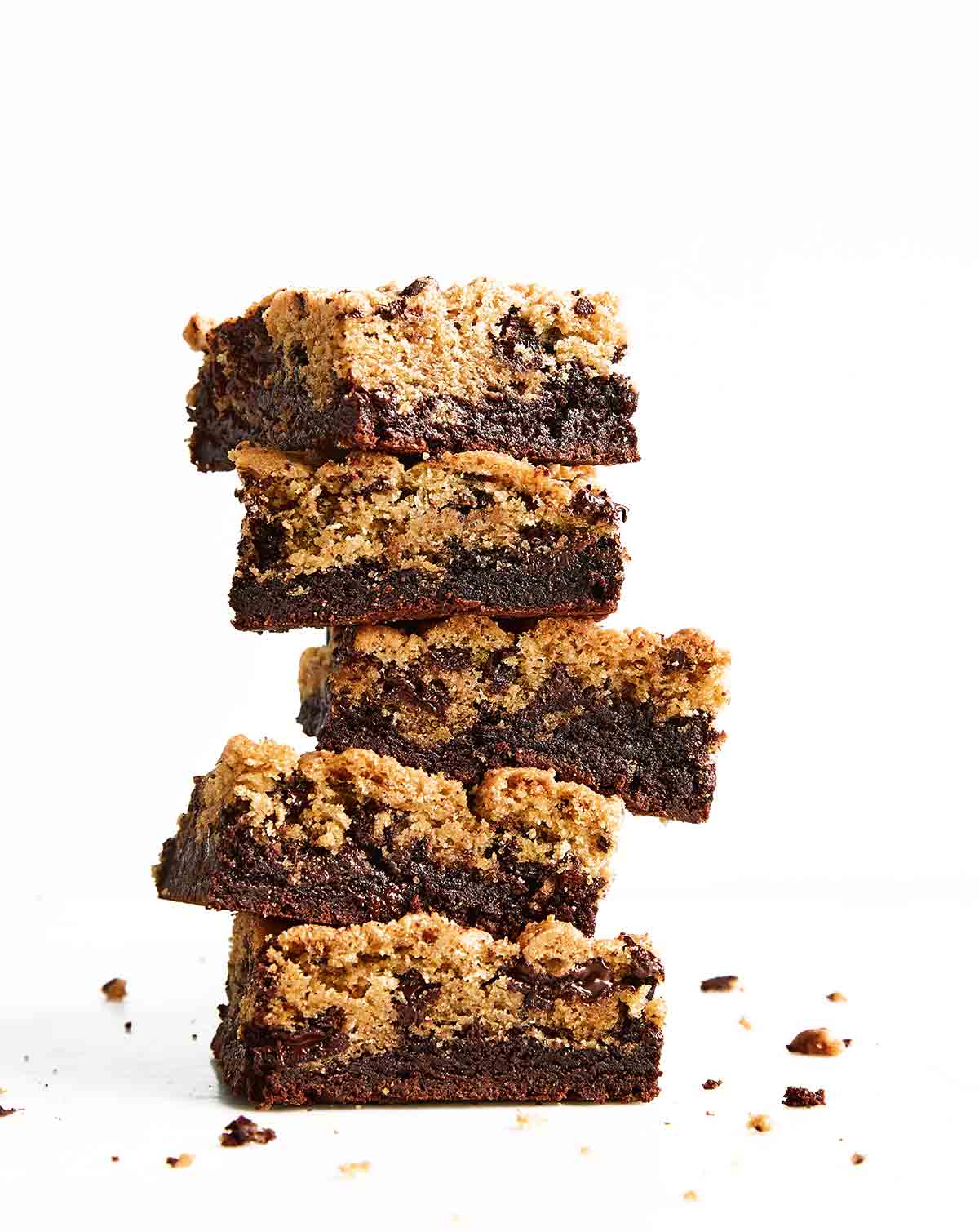 A stack of five chocolate chip cookie brownies.