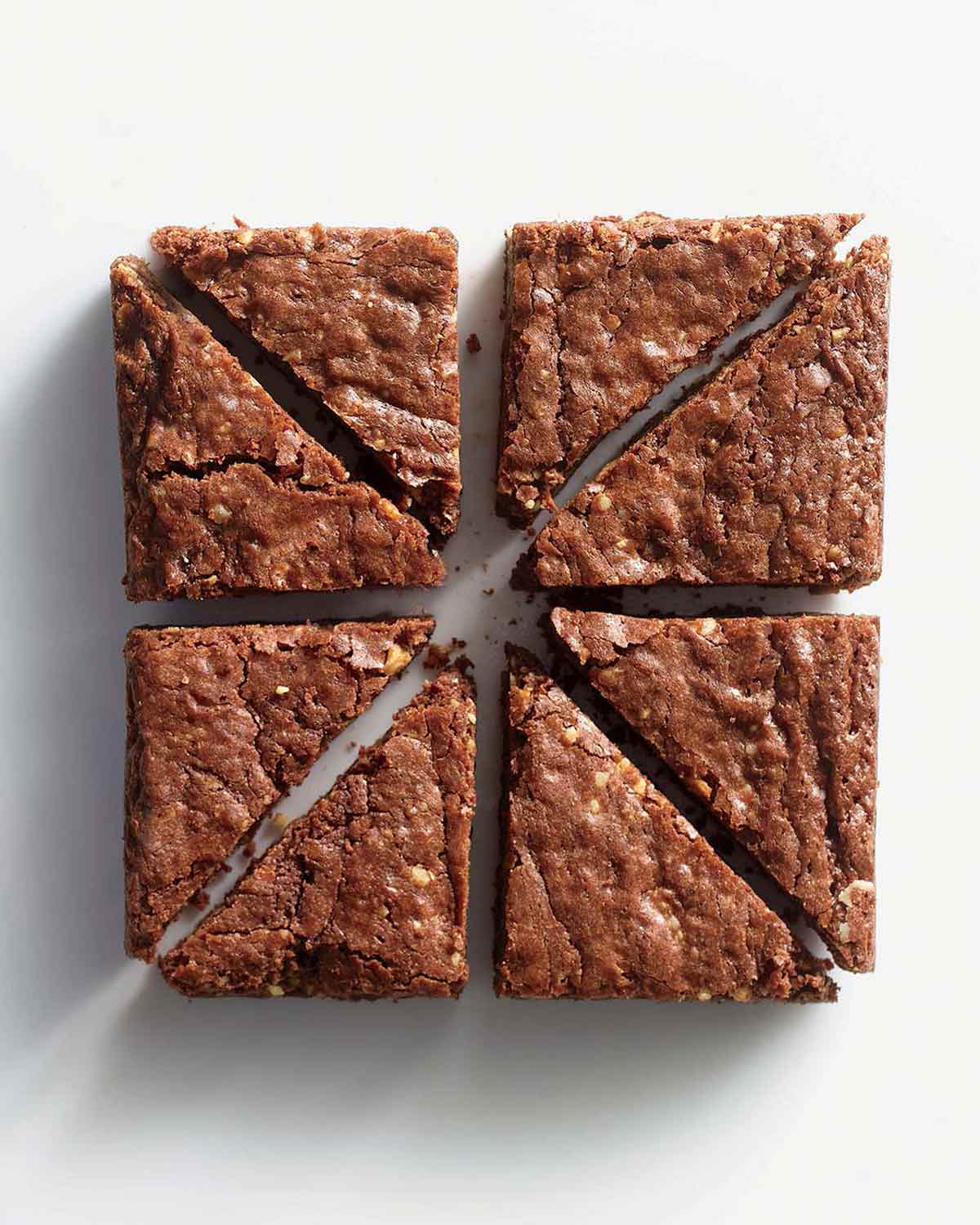 Eight triangle shaped pieces of nutella brownie.