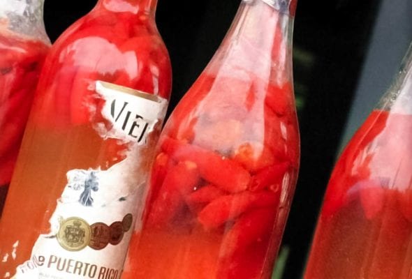 Four bottles of pepper sherry.