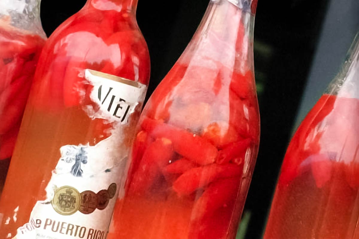 Four bottles of pepper sherry.