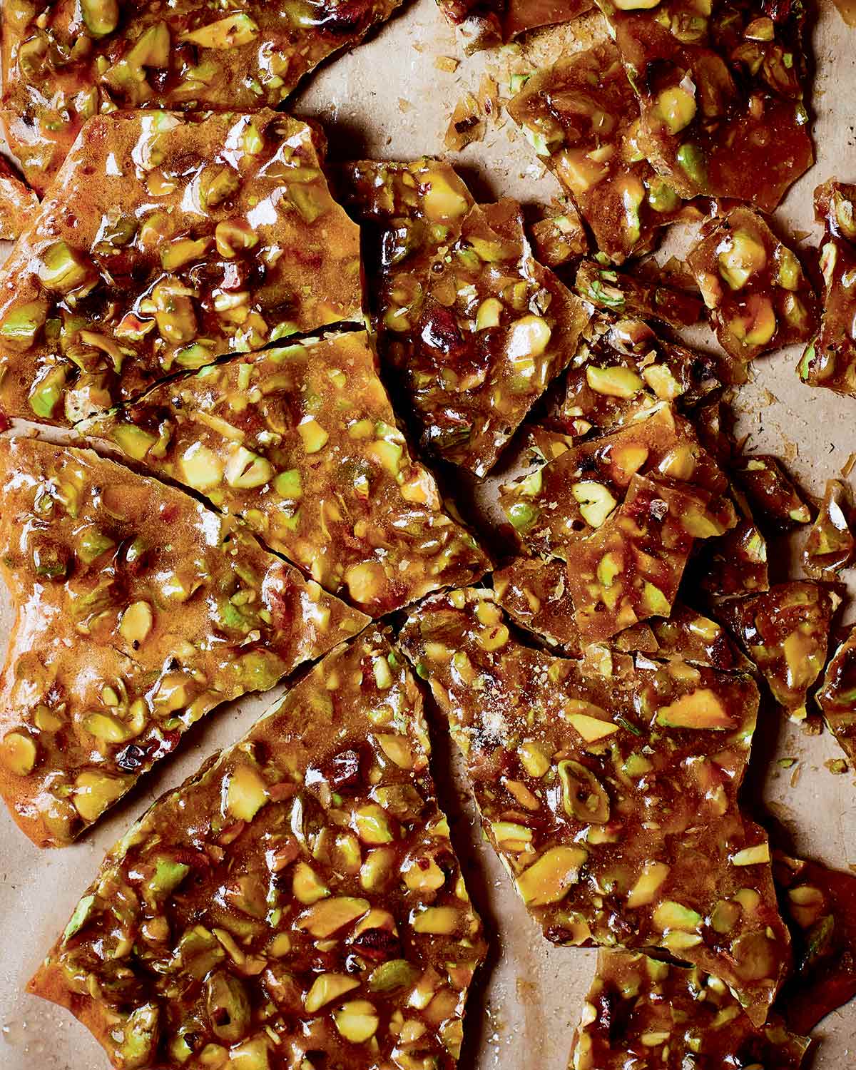 Irregular pieces of pistachio brittle.